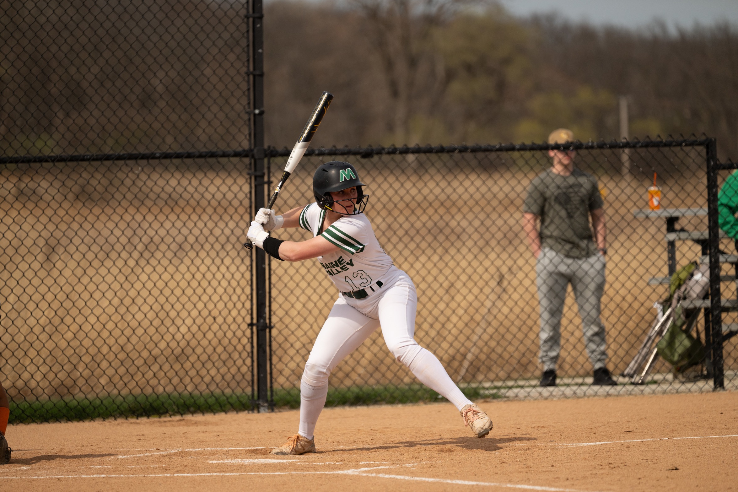 A Moraine Valley softball player batting.